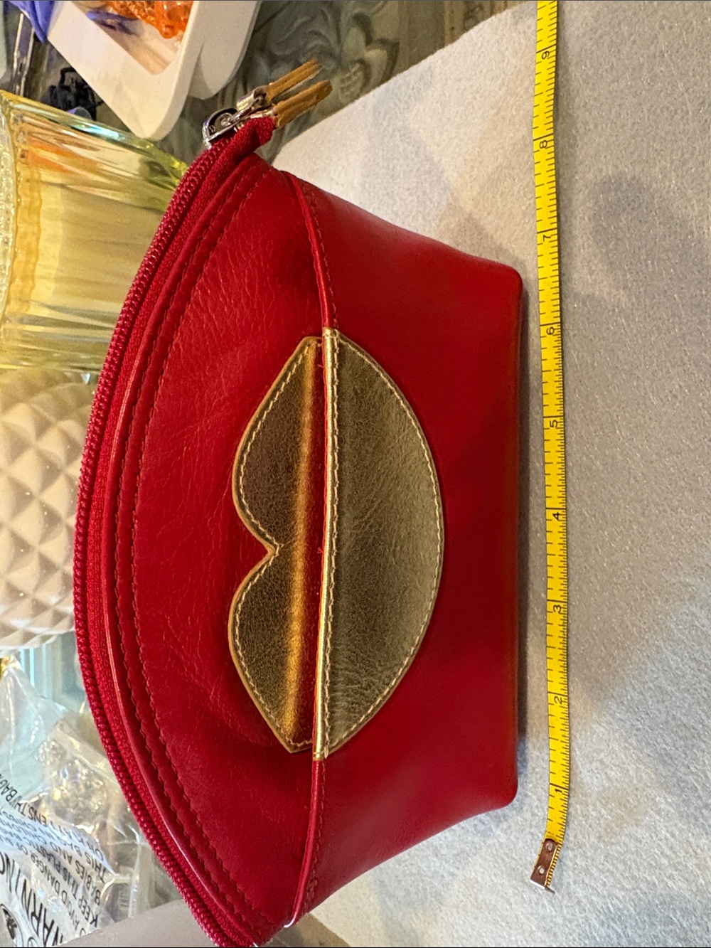 Red Pouch with Gold Lip Accent
